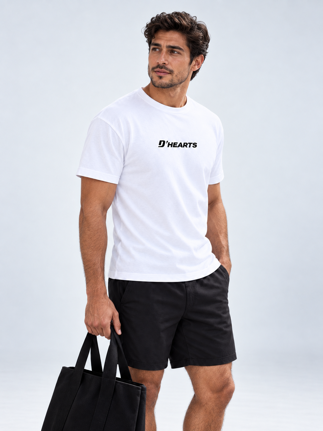 Man wearing the white D'HEARTS unisex short-sleeve tee